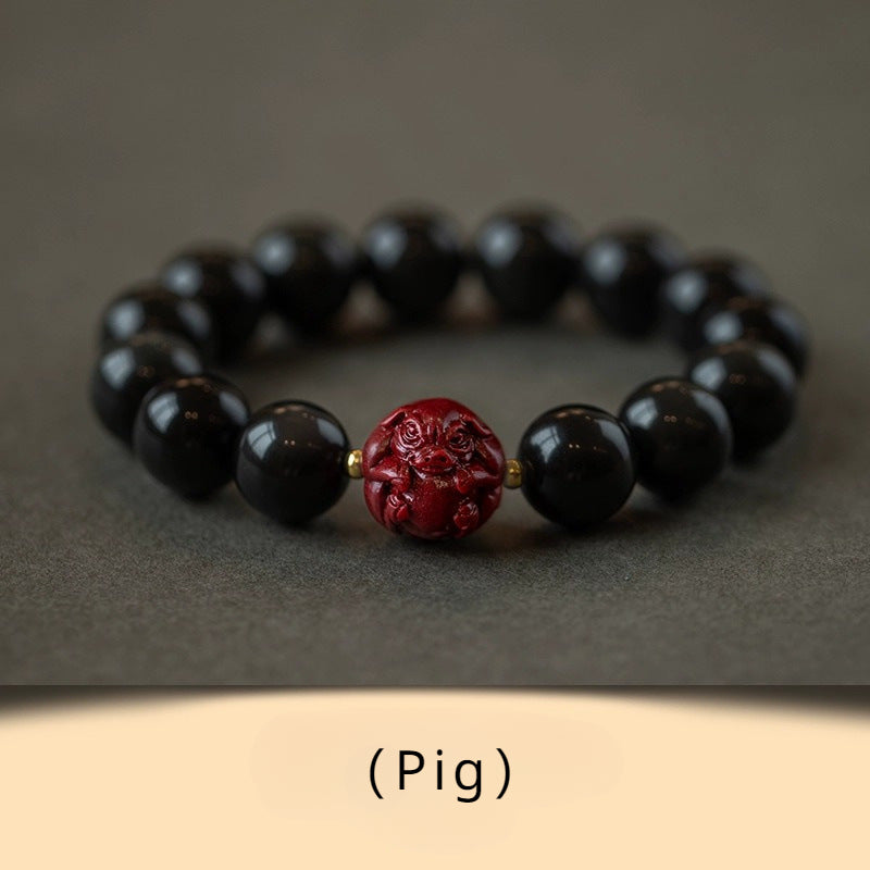 Obsidian and Cinnabar bracelet featuring the Twelve Chinese Zodiac signs for attracting good luck, protection, Buddhist guardianship, and health2
