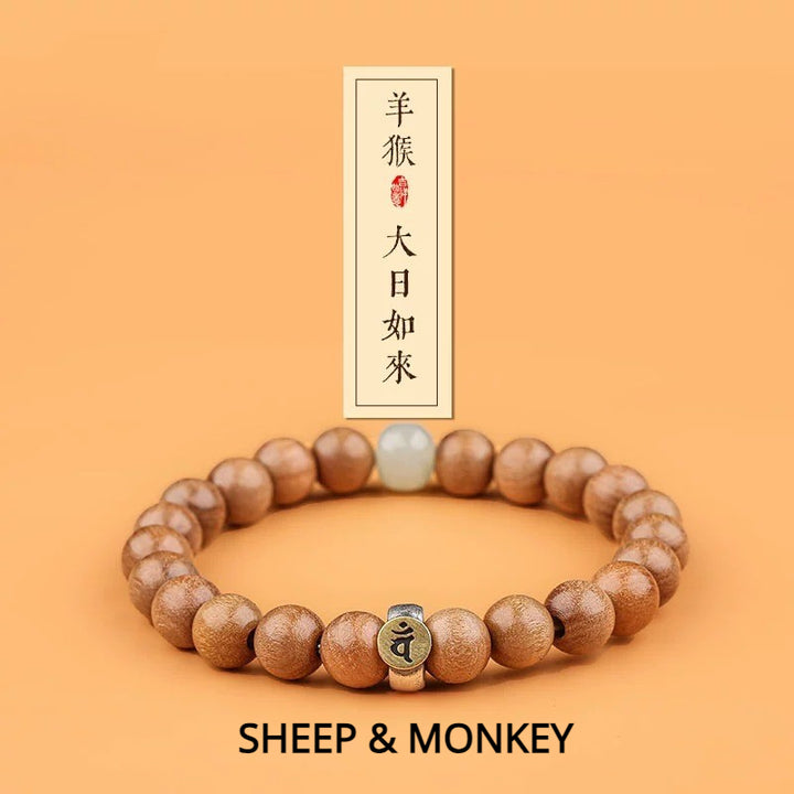 Peach Wood Zodiac Bracelet for attracting good luck, protection, wealth, and health with Buddhist Guardian symbols1