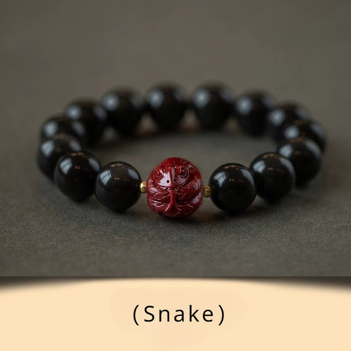 Obsidian and Cinnabar bracelet featuring the Twelve Chinese Zodiac signs for attracting good luck, protection, Buddhist guardianship, and health5