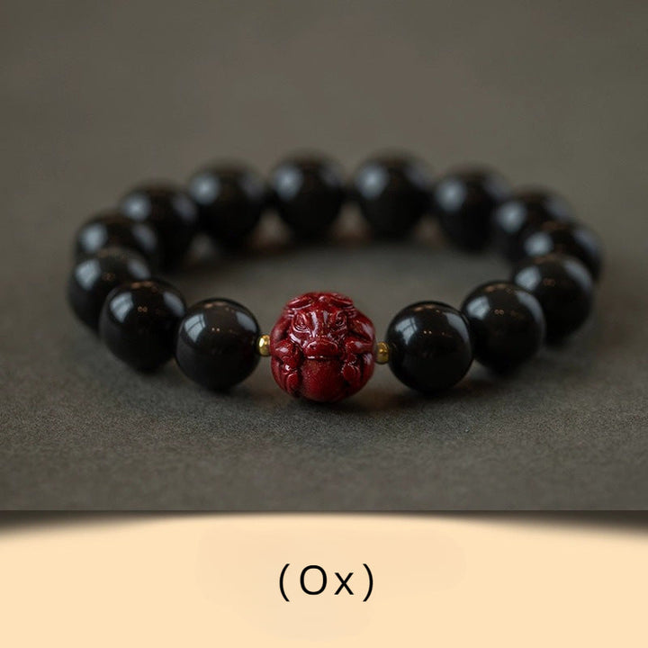Obsidian and Cinnabar bracelet featuring the Twelve Chinese Zodiac signs for attracting good luck, protection, Buddhist guardianship, and health1